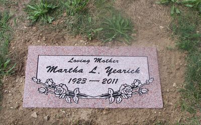 A flush cemetery headstone designed by Phillipsburg Marble and Granite in Phillipsburg, Pennsylvania