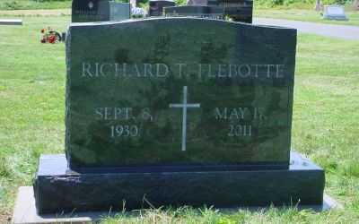 A jet black grave monument designed by Phillipsburg Marble and Granite in Phillipsburg, Pennsylvania