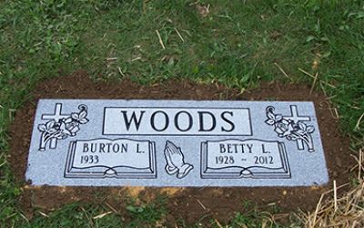 A flush cemetery headstone designed by Phillipsburg Marble and Granite in Phillipsburg, Pennsylvania