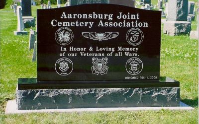 A jet black veteran's grave monument designed by Phillipsburg Marble and Granite in Phillipsburg, Pennsylvania